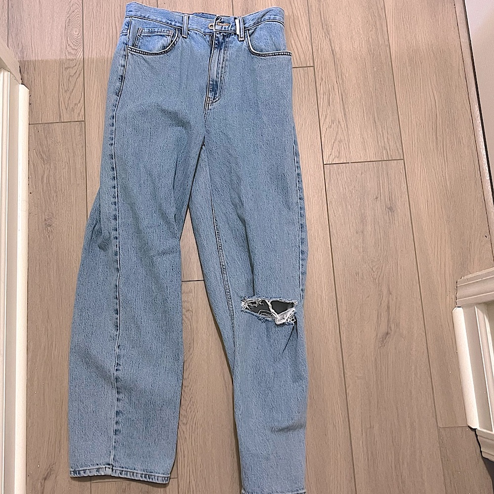 Collusion 90s baggy jean with rips in stonewash blue. Rip original see last pic